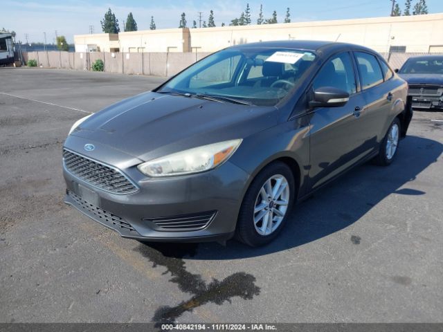 Photo 1 VIN: 1FADP3F29GL345470 - FORD FOCUS 