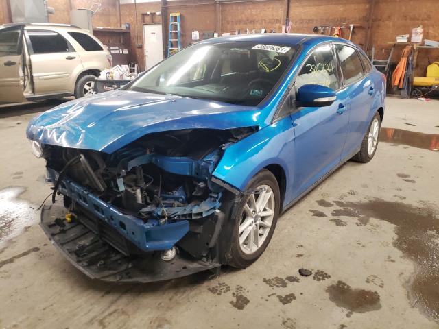 Photo 1 VIN: 1FADP3F29GL354959 - FORD FOCUS 