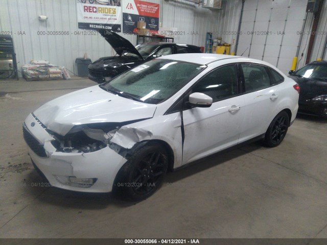 Photo 1 VIN: 1FADP3F29GL374449 - FORD FOCUS 