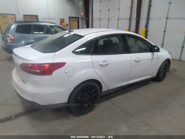 Photo 3 VIN: 1FADP3F29GL374449 - FORD FOCUS 