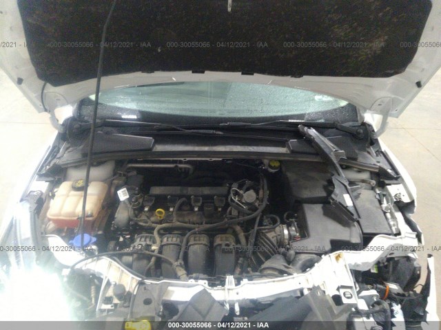 Photo 9 VIN: 1FADP3F29GL374449 - FORD FOCUS 