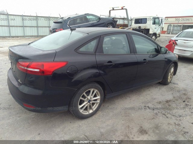 Photo 3 VIN: 1FADP3F29GL381630 - FORD FOCUS 