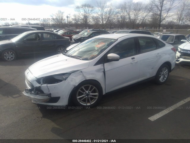 Photo 1 VIN: 1FADP3F29GL389128 - FORD FOCUS 