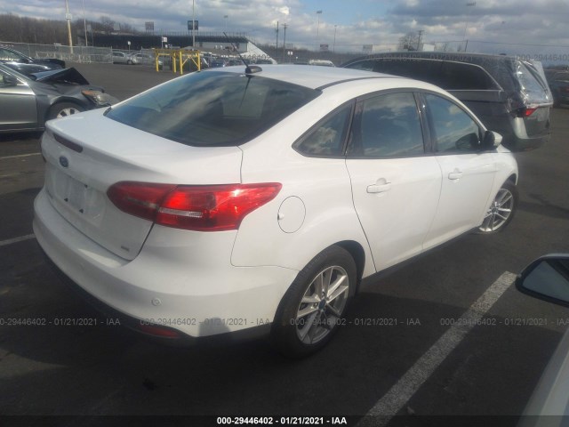 Photo 3 VIN: 1FADP3F29GL389128 - FORD FOCUS 