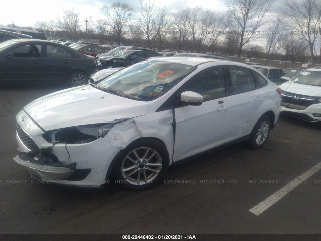 Photo 5 VIN: 1FADP3F29GL389128 - FORD FOCUS 