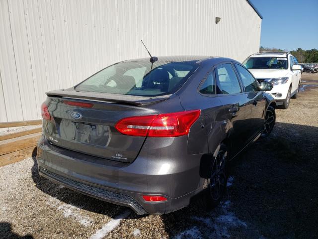 Photo 3 VIN: 1FADP3F29GL389470 - FORD FOCUS SE 