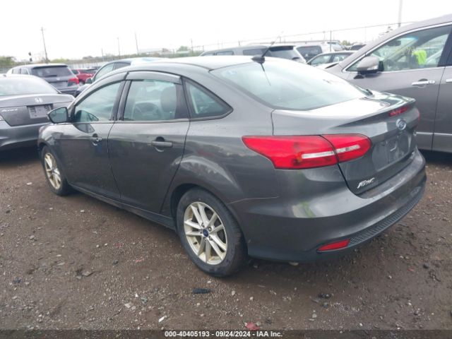 Photo 2 VIN: 1FADP3F29GL390571 - FORD FOCUS 