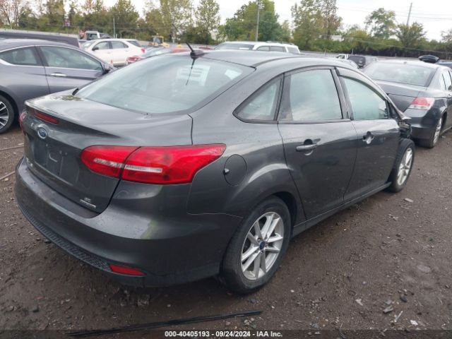 Photo 3 VIN: 1FADP3F29GL390571 - FORD FOCUS 