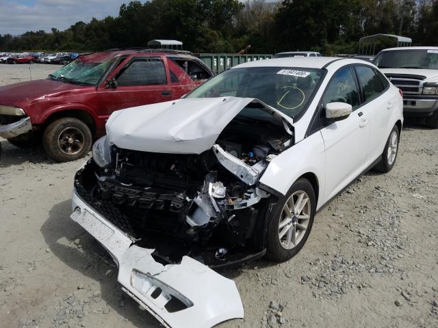 Photo 1 VIN: 1FADP3F29GL401763 - FORD FOCUS 