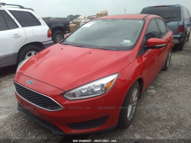 Photo 1 VIN: 1FADP3F29GL404713 - FORD FOCUS 