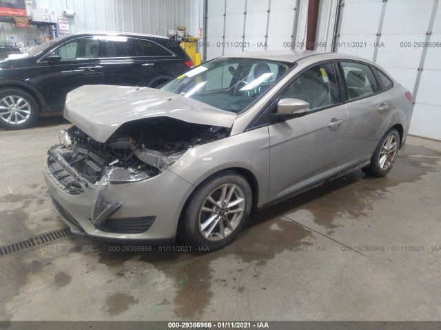 Photo 1 VIN: 1FADP3F29GL405375 - FORD FOCUS 