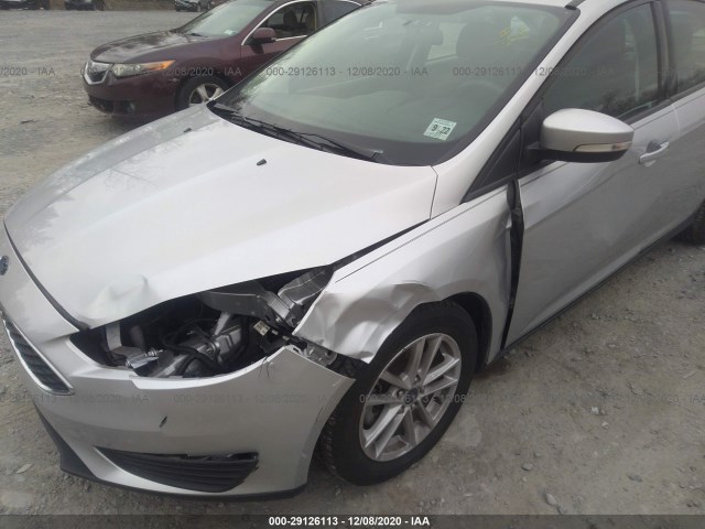 Photo 5 VIN: 1FADP3F29HL200947 - FORD FOCUS 