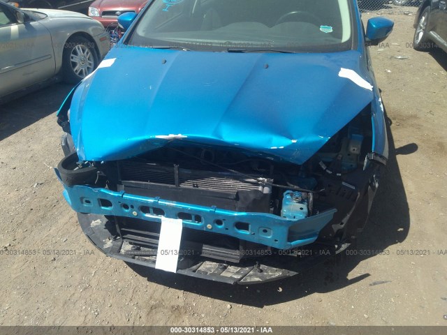 Photo 5 VIN: 1FADP3F29HL203220 - FORD FOCUS 