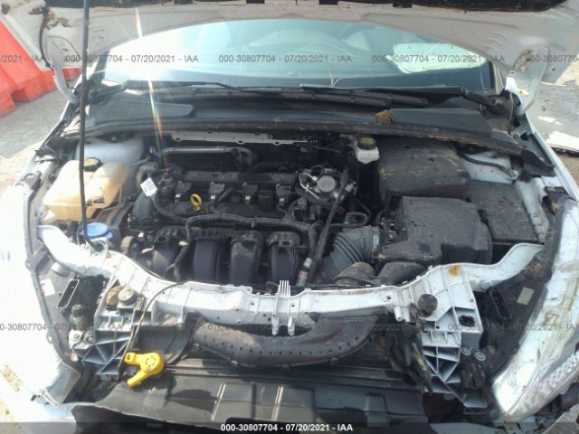 Photo 9 VIN: 1FADP3F29HL205873 - FORD FOCUS 