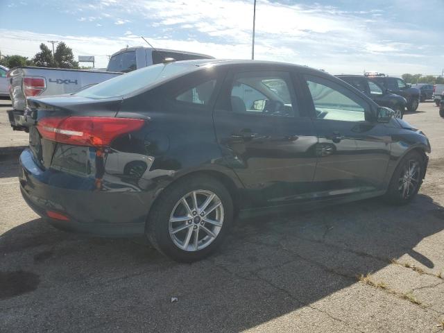 Photo 2 VIN: 1FADP3F29HL209793 - FORD FOCUS SE 