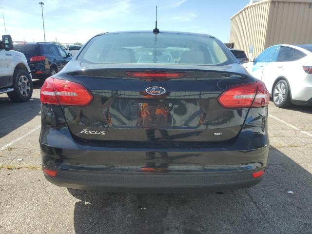 Photo 5 VIN: 1FADP3F29HL209793 - FORD FOCUS SE 