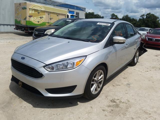 Photo 1 VIN: 1FADP3F29HL228084 - FORD FOCUS SE 