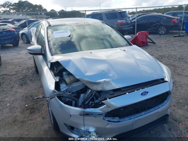 Photo 5 VIN: 1FADP3F29HL231339 - FORD FOCUS 