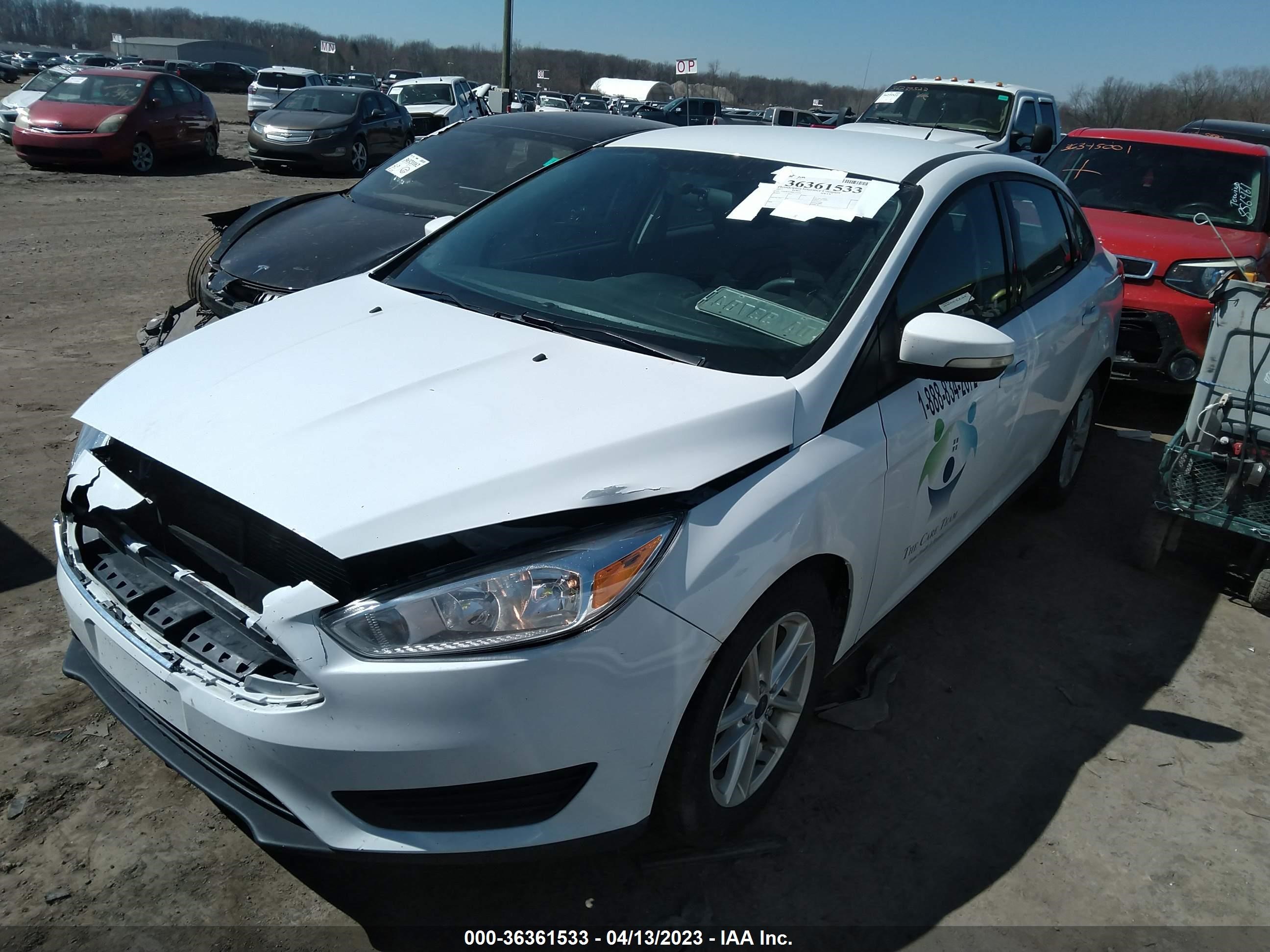 Photo 1 VIN: 1FADP3F29HL235293 - FORD FOCUS 