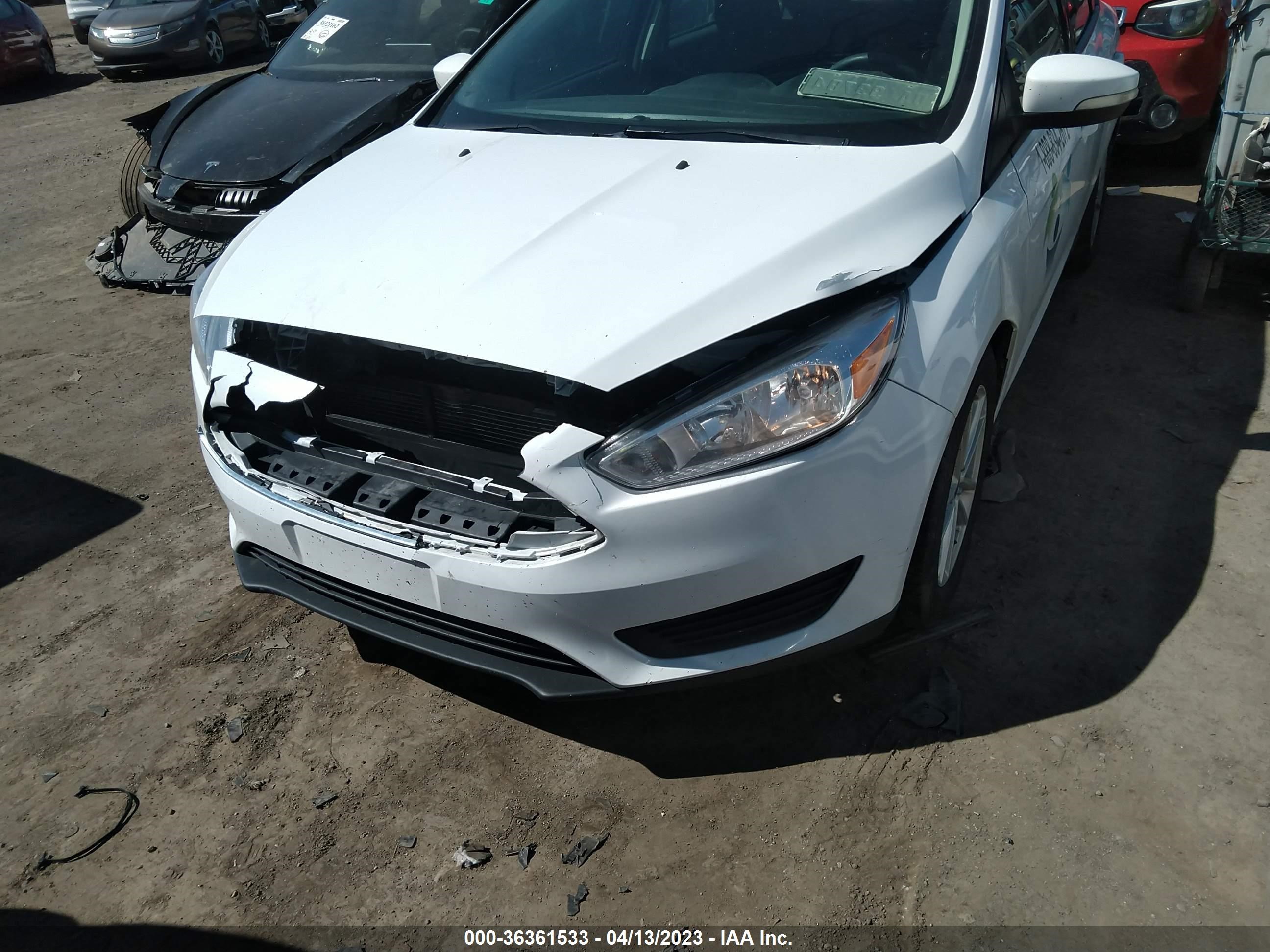 Photo 5 VIN: 1FADP3F29HL235293 - FORD FOCUS 