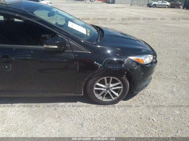 Photo 5 VIN: 1FADP3F29HL236766 - FORD FOCUS 