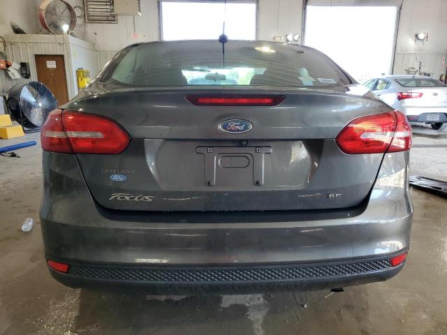 Photo 5 VIN: 1FADP3F29HL266317 - FORD FOCUS SE 