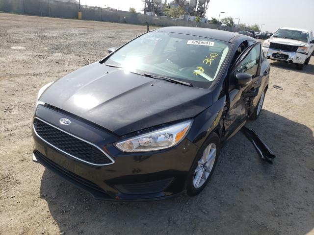 Photo 1 VIN: 1FADP3F29HL271095 - FORD FOCUS SE 