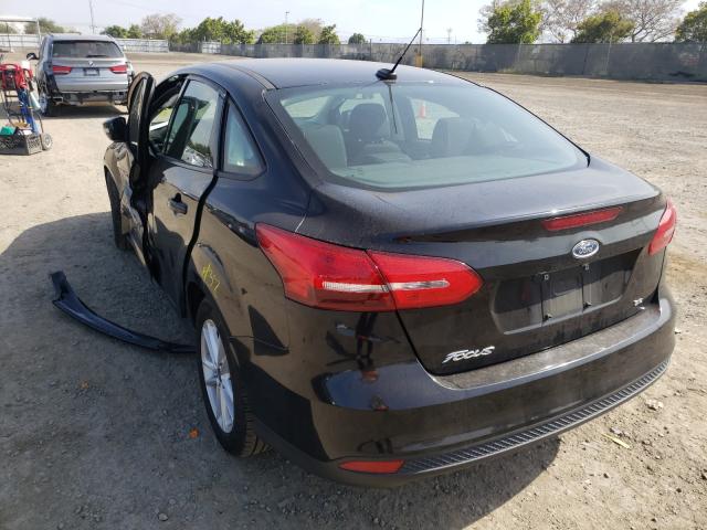 Photo 2 VIN: 1FADP3F29HL271095 - FORD FOCUS SE 