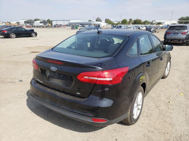 Photo 3 VIN: 1FADP3F29HL271095 - FORD FOCUS SE 