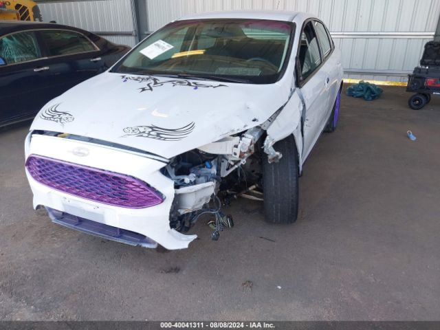 Photo 5 VIN: 1FADP3F29HL288544 - FORD FOCUS 