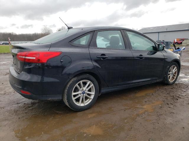 Photo 2 VIN: 1FADP3F29HL298667 - FORD FOCUS SE 