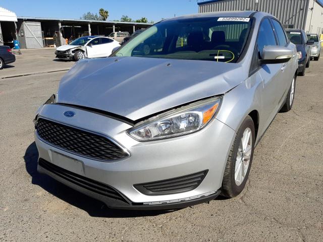 Photo 1 VIN: 1FADP3F29HL300160 - FORD FOCUS SE 