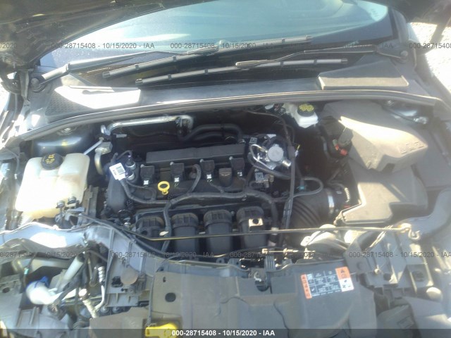 Photo 9 VIN: 1FADP3F29HL304290 - FORD FOCUS 