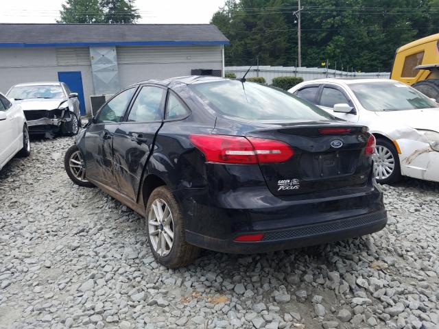 Photo 2 VIN: 1FADP3F29HL311823 - FORD FOCUS SE 