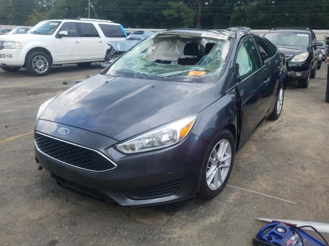 Photo 1 VIN: 1FADP3F29HL312244 - FORD FOCUS SE 