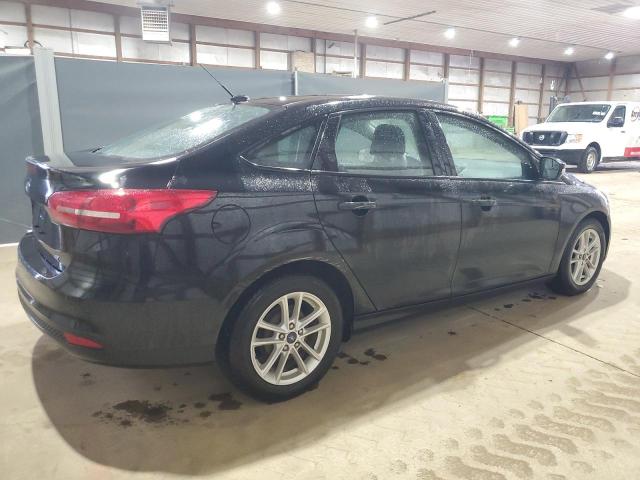 Photo 2 VIN: 1FADP3F29HL318027 - FORD FOCUS SE 