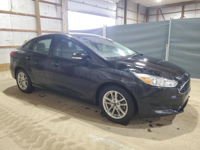 Photo 3 VIN: 1FADP3F29HL318027 - FORD FOCUS SE 