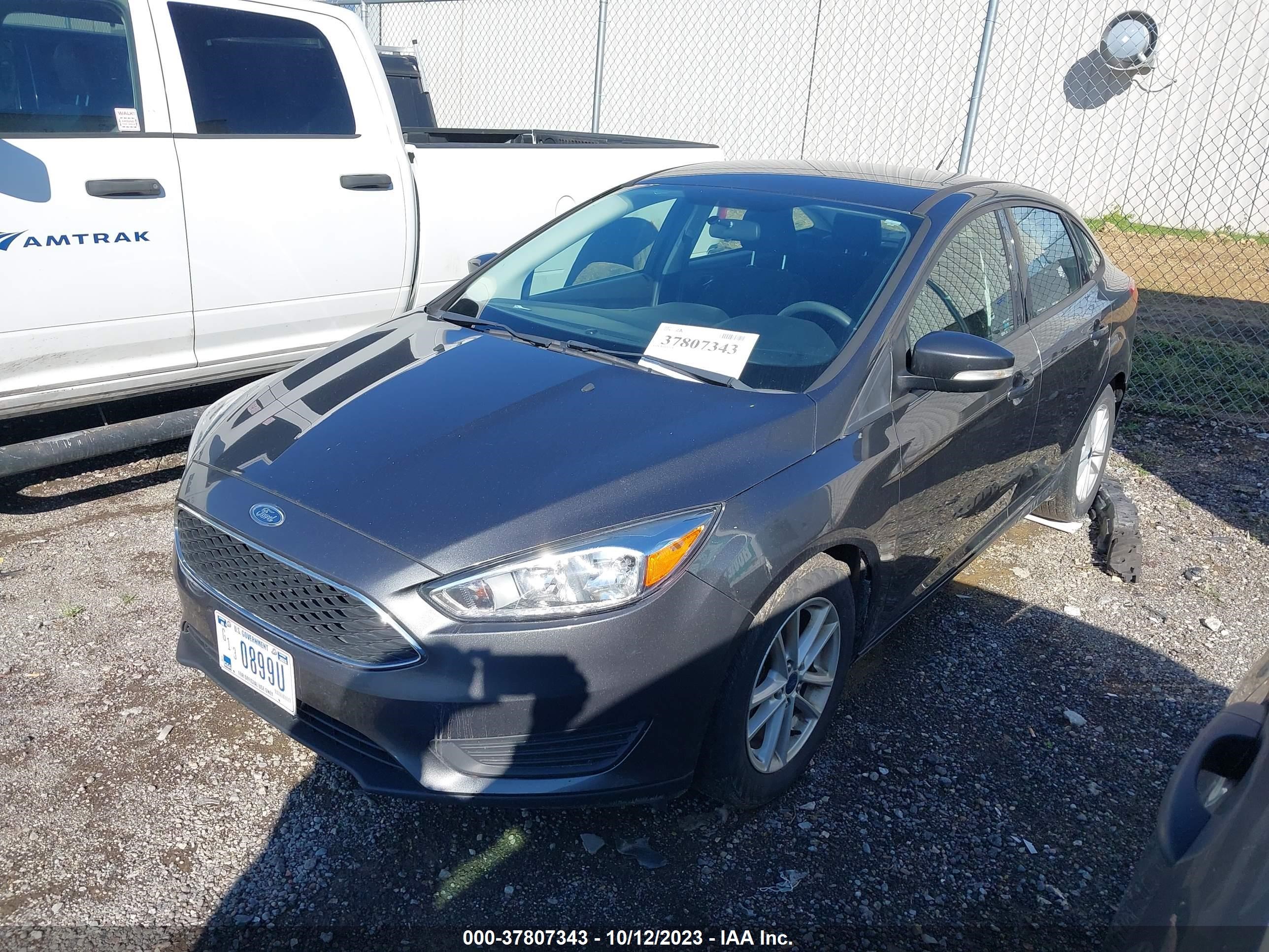 Photo 1 VIN: 1FADP3F29HL320120 - FORD FOCUS 