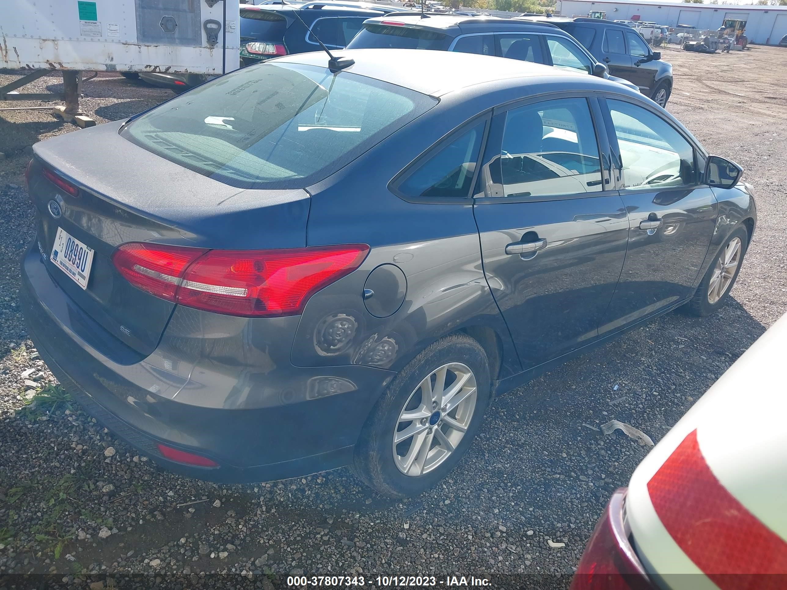 Photo 3 VIN: 1FADP3F29HL320120 - FORD FOCUS 