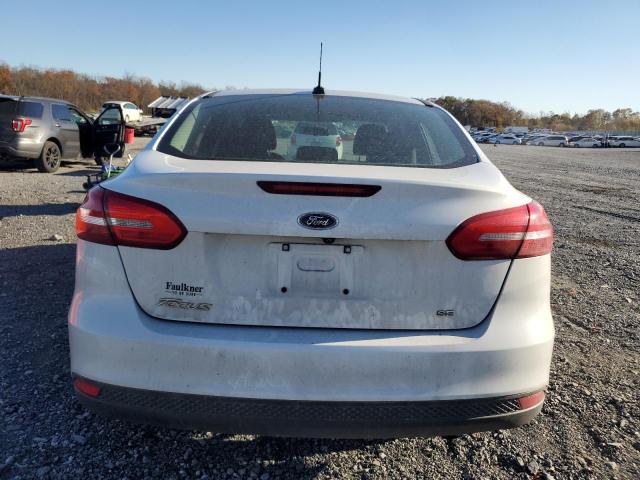 Photo 5 VIN: 1FADP3F29HL336222 - FORD FOCUS SE 