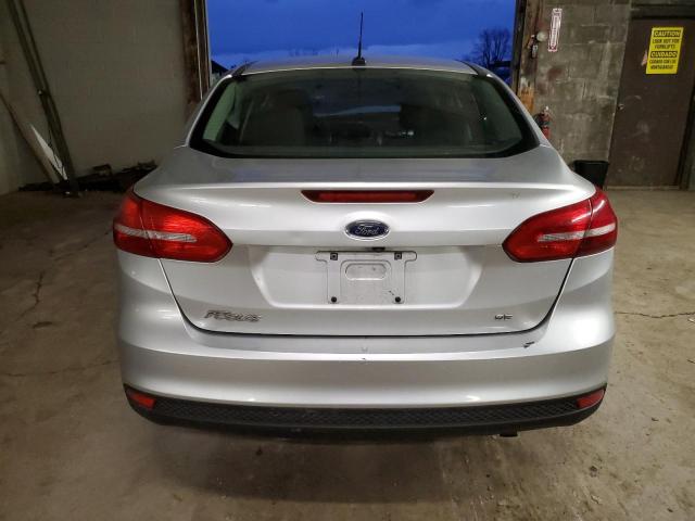 Photo 5 VIN: 1FADP3F29JL205944 - FORD FOCUS 