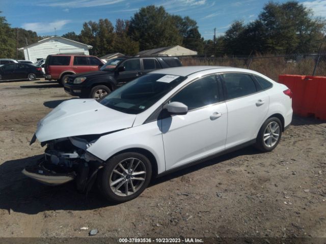 Photo 1 VIN: 1FADP3F29JL219942 - FORD FOCUS 