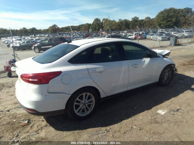 Photo 3 VIN: 1FADP3F29JL219942 - FORD FOCUS 