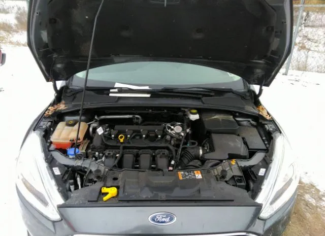 Photo 9 VIN: 1FADP3F29JL222209 - FORD FOCUS 