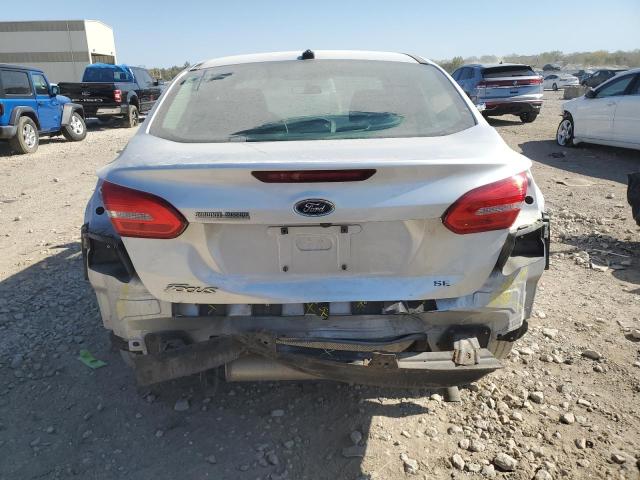 Photo 5 VIN: 1FADP3F29JL223201 - FORD FOCUS 