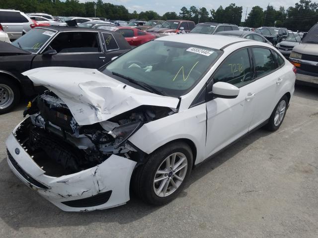 Photo 1 VIN: 1FADP3F29JL226602 - FORD FOCUS 