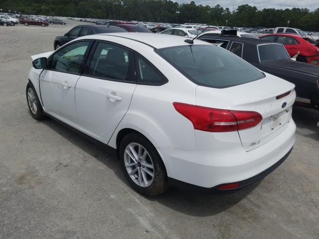 Photo 2 VIN: 1FADP3F29JL226602 - FORD FOCUS 