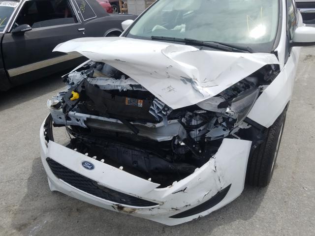 Photo 8 VIN: 1FADP3F29JL226602 - FORD FOCUS 