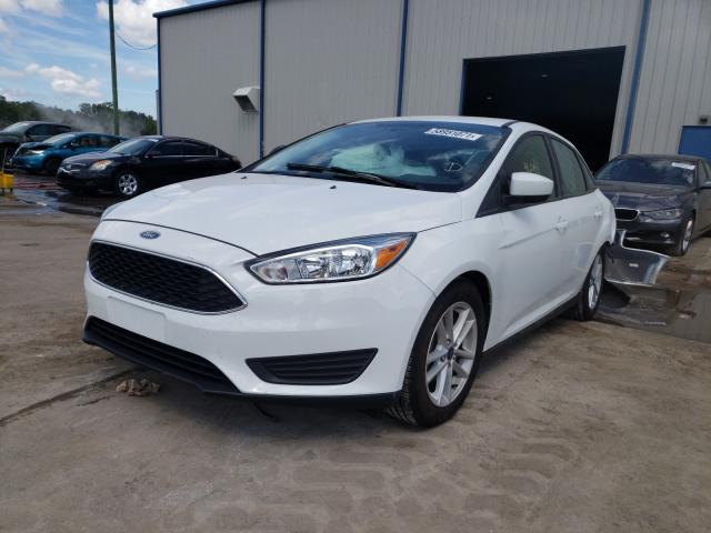 Photo 1 VIN: 1FADP3F29JL256392 - FORD FOCUS SE 