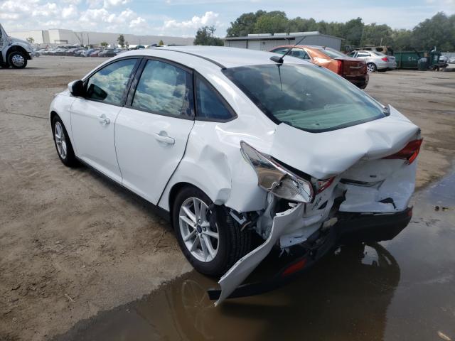 Photo 2 VIN: 1FADP3F29JL256392 - FORD FOCUS SE 